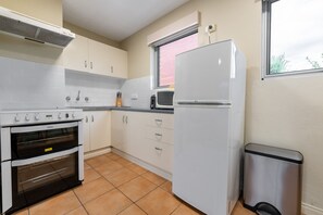Standard One Bedroom Apartment  | Private kitchen | Electric kettle, toaster