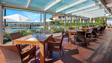 Breakfast and dinner served, pool views