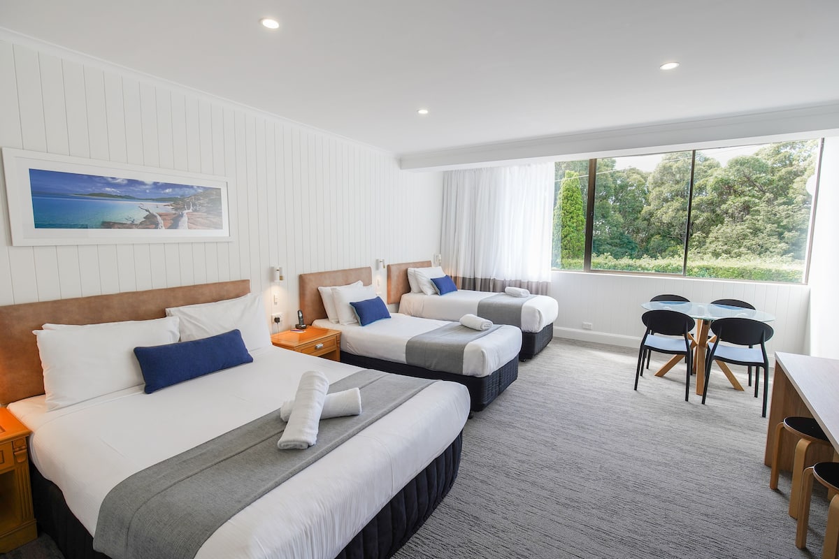 standard room, multiple beds | premium bedding, minibar, desk, blackout curtains