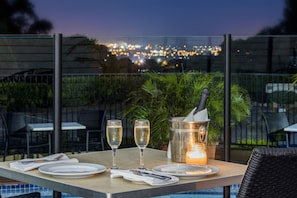 Breakfast, lunch, dinner served; Modern European cuisine, pool views