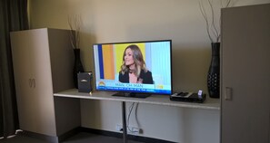 Room 26: Family Room with 50 inch Smart TV located on First Floor | Room amenity