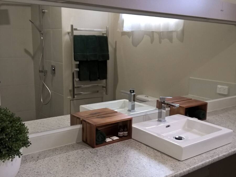 Room 26: Family Room with 50 inch Smart TV located on First Floor | Bathroom sink