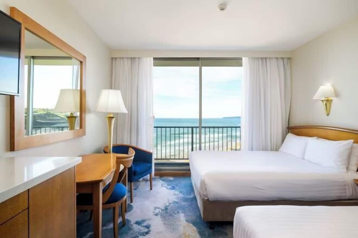 Minibar, desk, blackout curtains, iron/ironing board