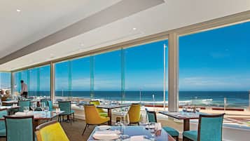 Breakfast, lunch, dinner served; sea views