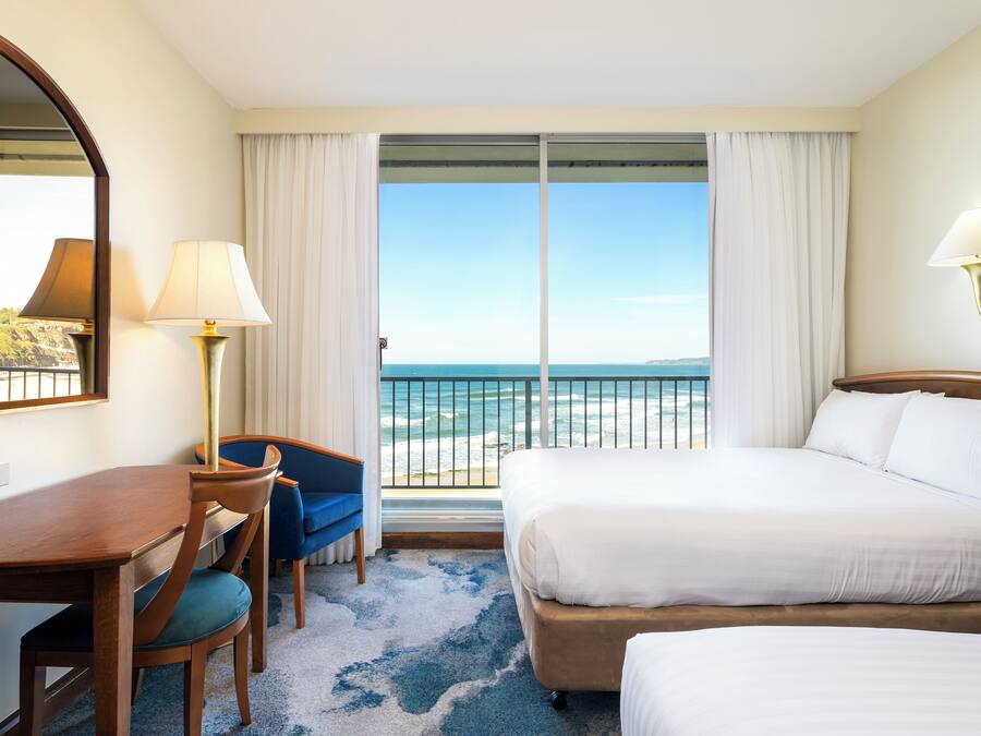 Queen and Single Ocean View | Minibar, desk, blackout drapes, iron/ironing board
