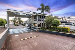 A modern building with a reception area, marked by a sign for the Conference Centre and Park Motor Inn. - Park Motor Inn (East Toowoomba)
