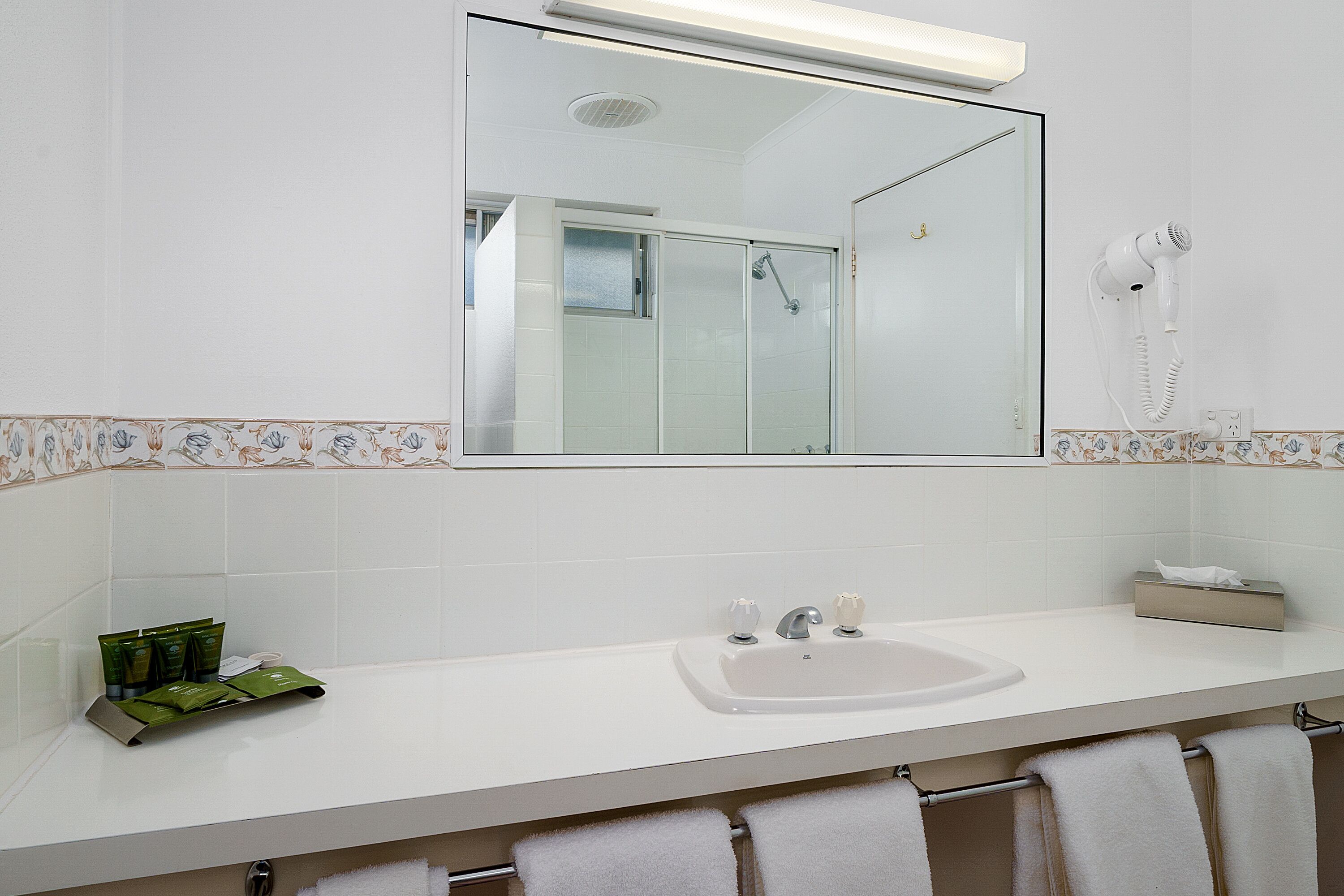 family room | bathroom | shower, free toiletries, hair dryer, towels