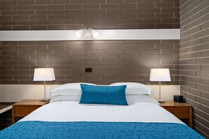 Family Room | Premium bedding, pillow-top beds, minibar, in-room safe