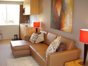 Executive Suite with Balcony | Living area | LCD TV
