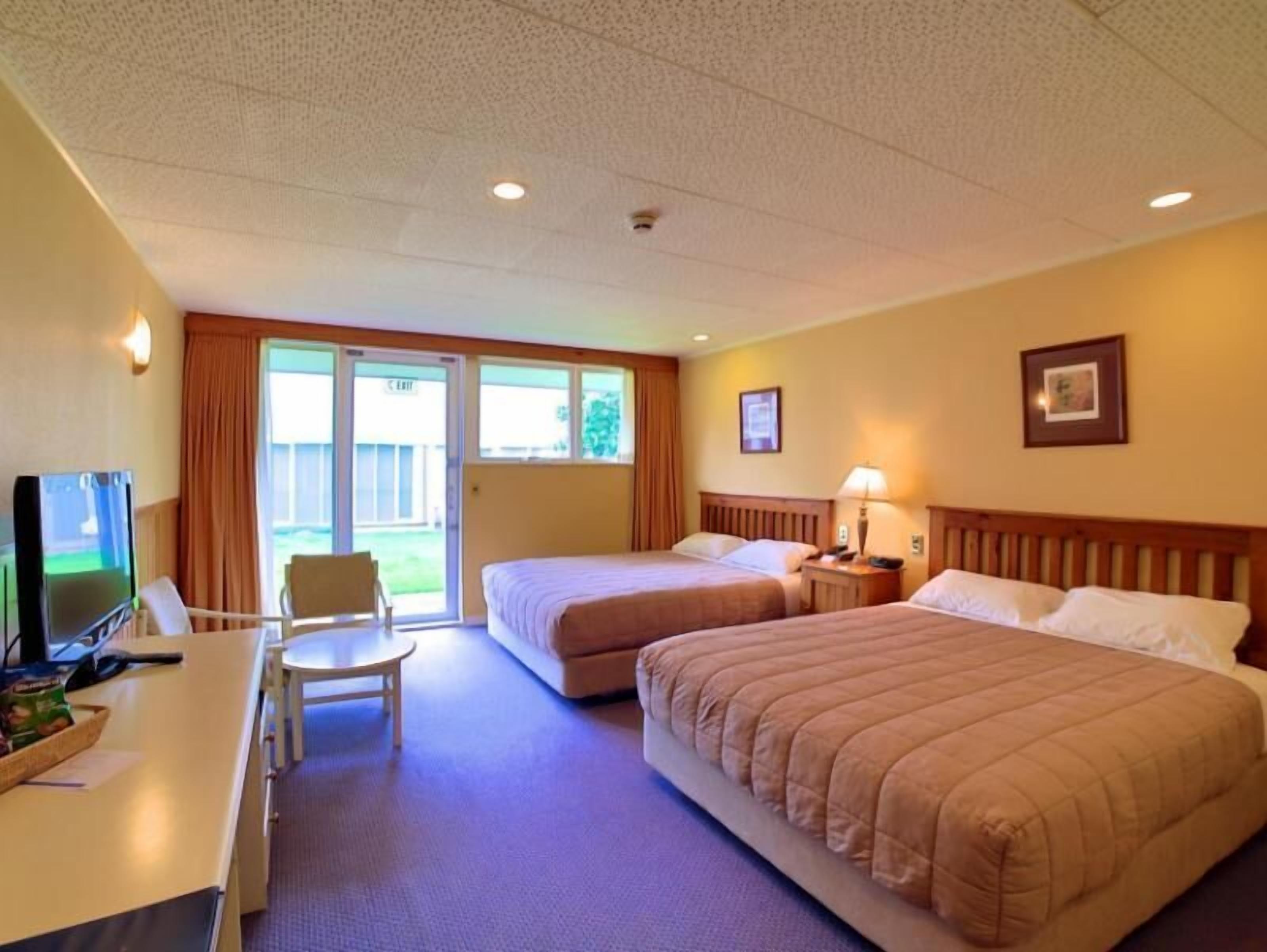 Desk, blackout curtains, iron/ironing board, WiFi