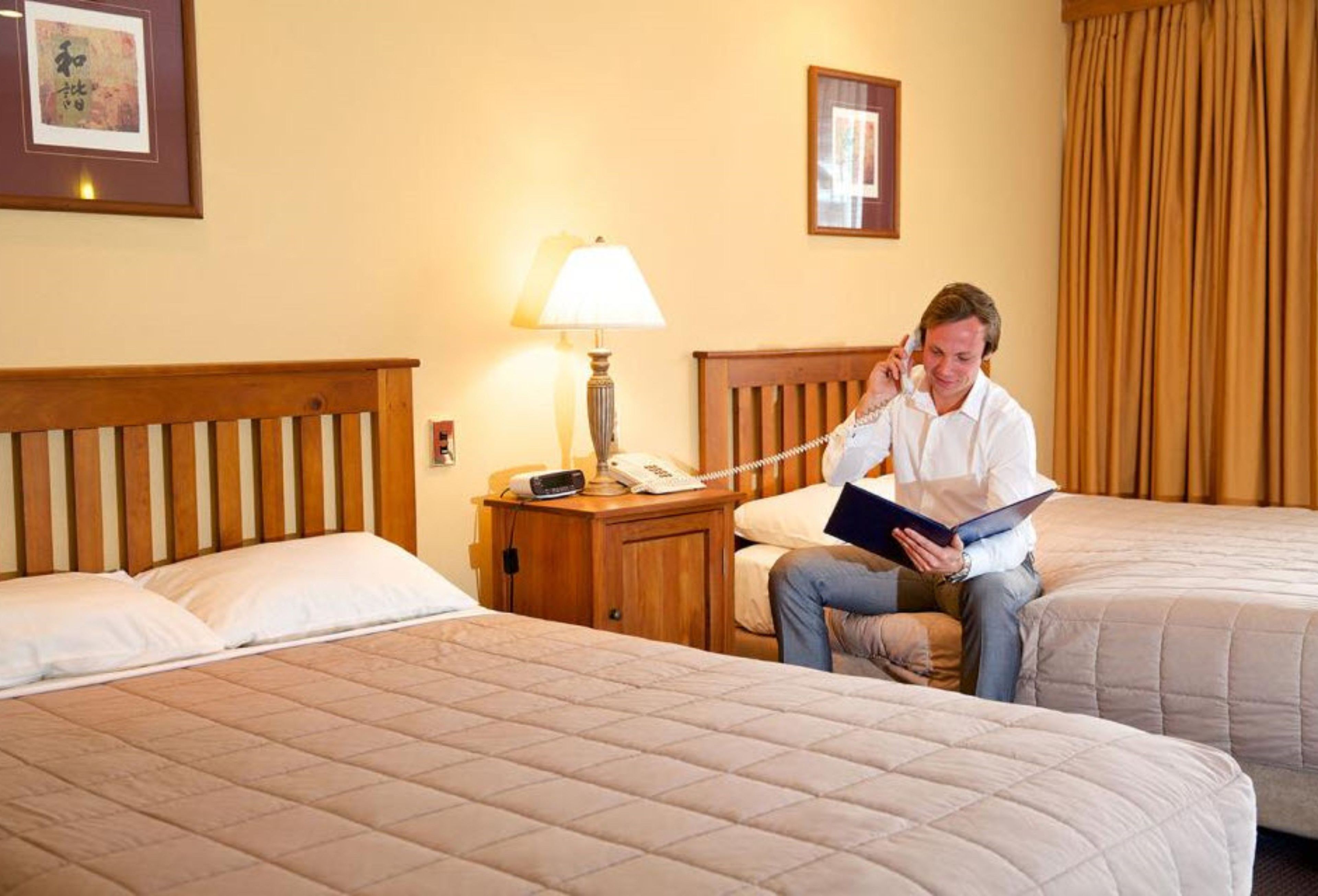 superior twin | desk, blackout curtains, iron/ironing board, wifi