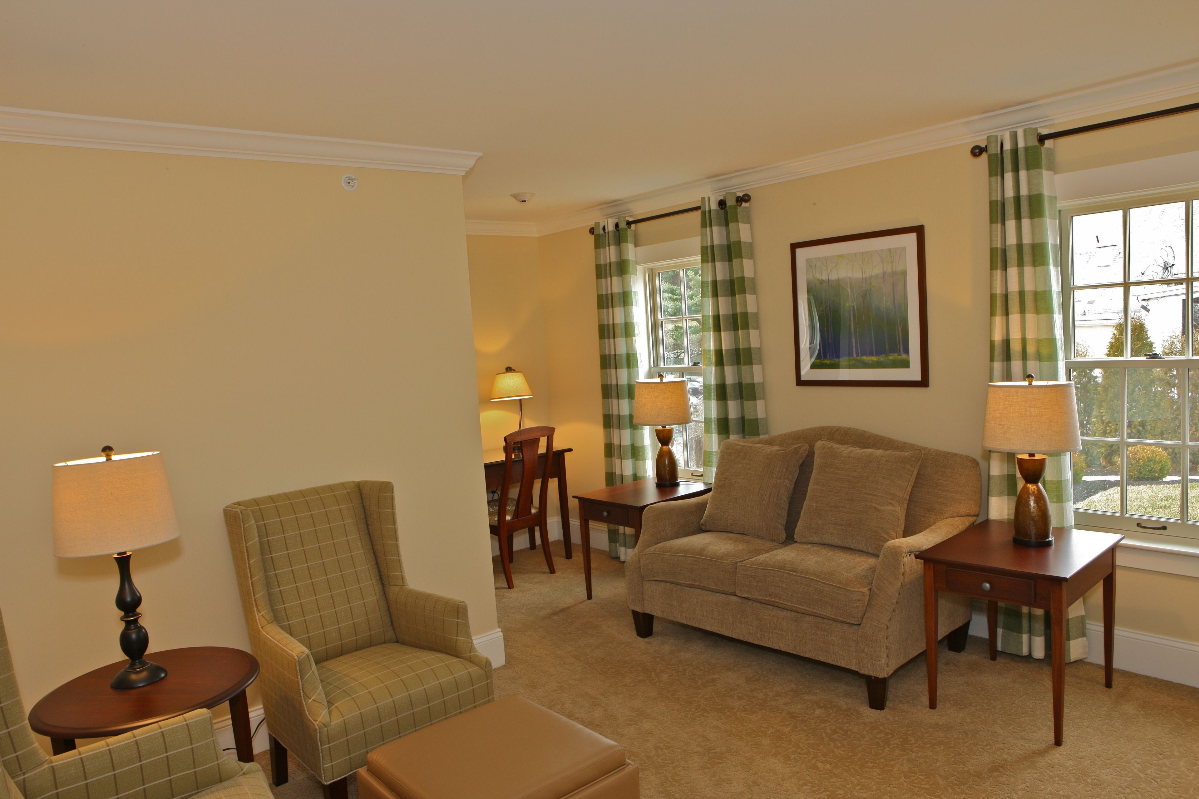 chamberlain house king suite (no pets) | living area | 36-inch flat-screen tv with cable channels, tv