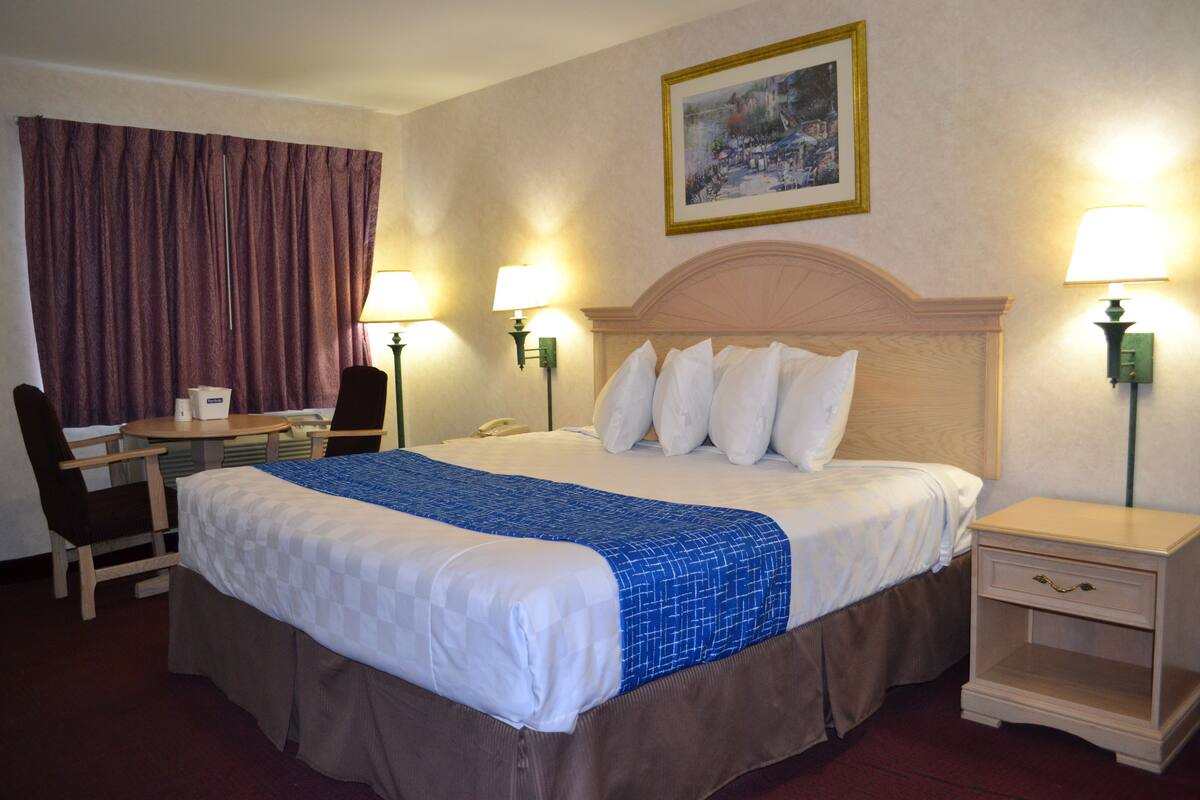 Desk, blackout drapes, cribs (free), WiFi (free)