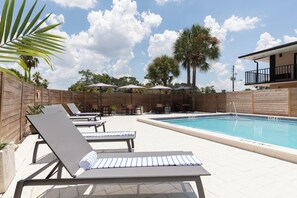 Outdoor pool, pool umbrellas, pool loungers