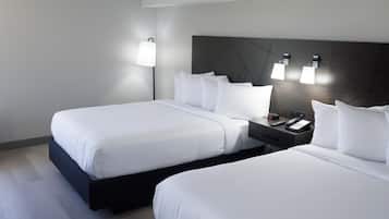 Standard Room, 2 Queen Beds, Non Smoking | In-room safe, desk, laptop workspace, soundproofing