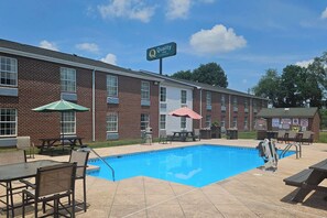 Seasonal outdoor pool, open 9:00 AM to 9:00 PM, pool umbrellas
