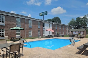 Seasonal outdoor pool, open 9:00 AM to 9:00 PM, pool umbrellas