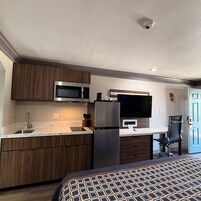 Room, 1 King Bed | Private kitchen | Fridge, microwave, coffee/tea maker