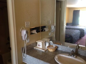 Combined shower/tub, deep soaking tub, free toiletries, hair dryer