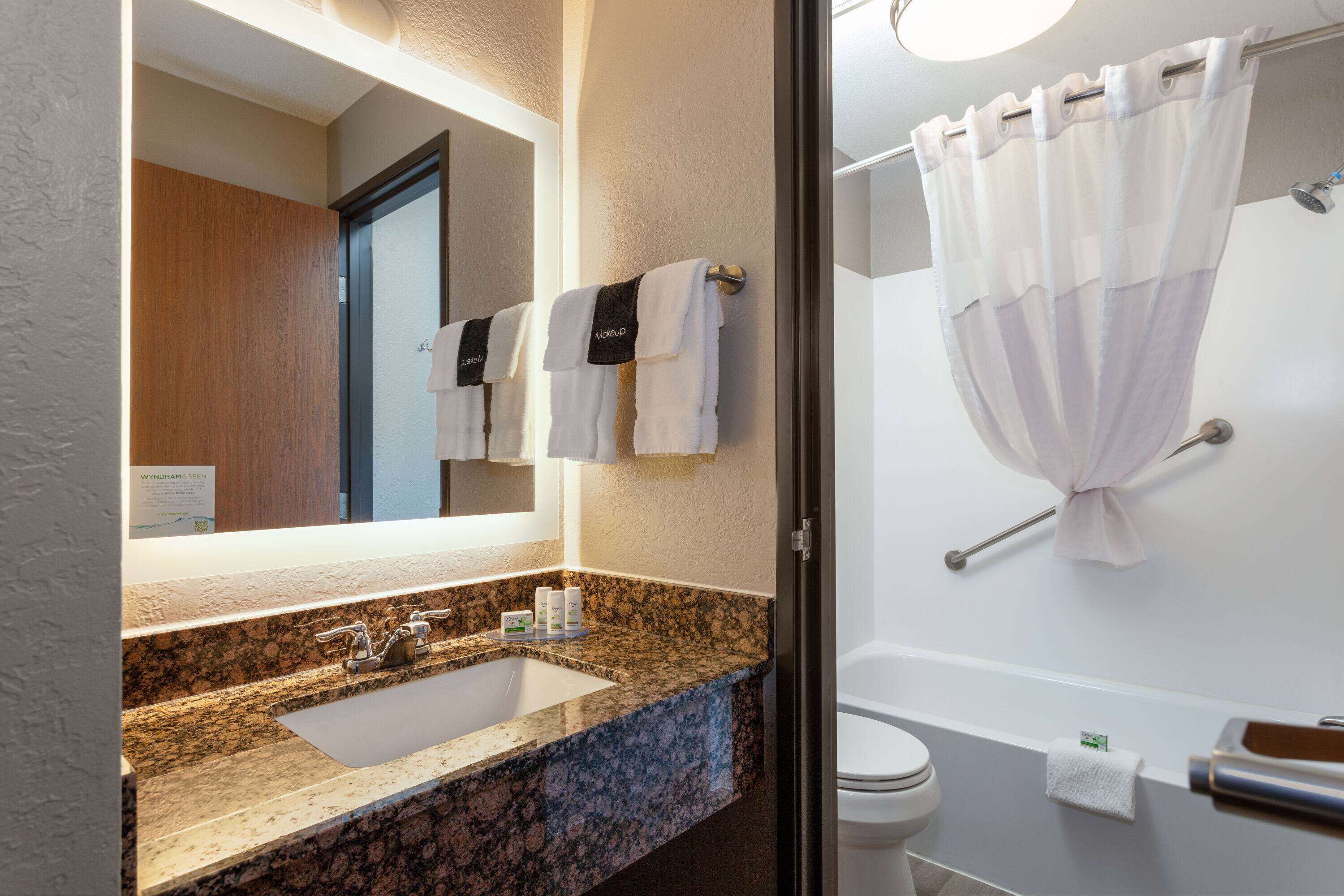 combined shower/bathtub, free toiletries, hair dryer, towels