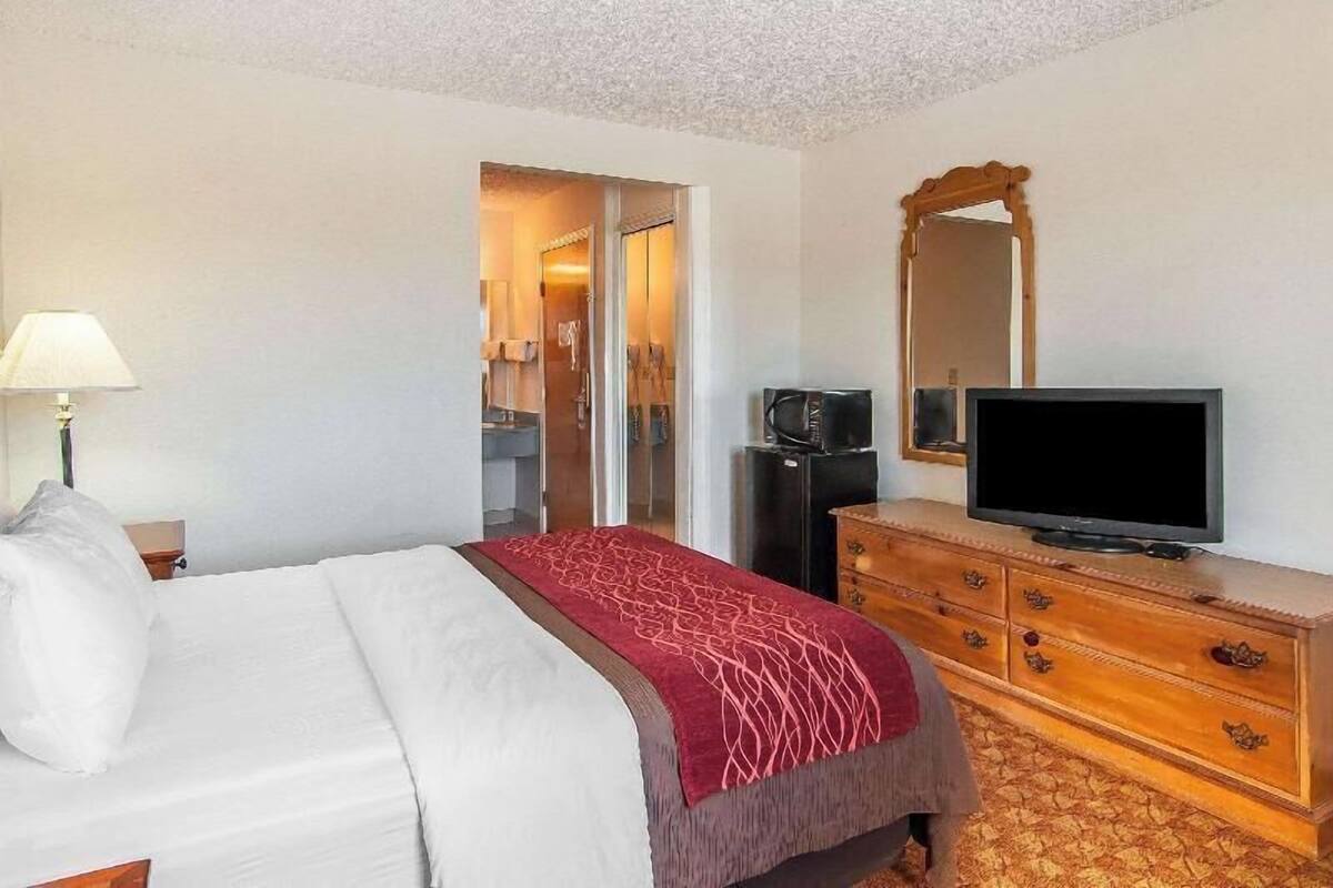Premium bedding, desk, blackout curtains, iron/ironing board