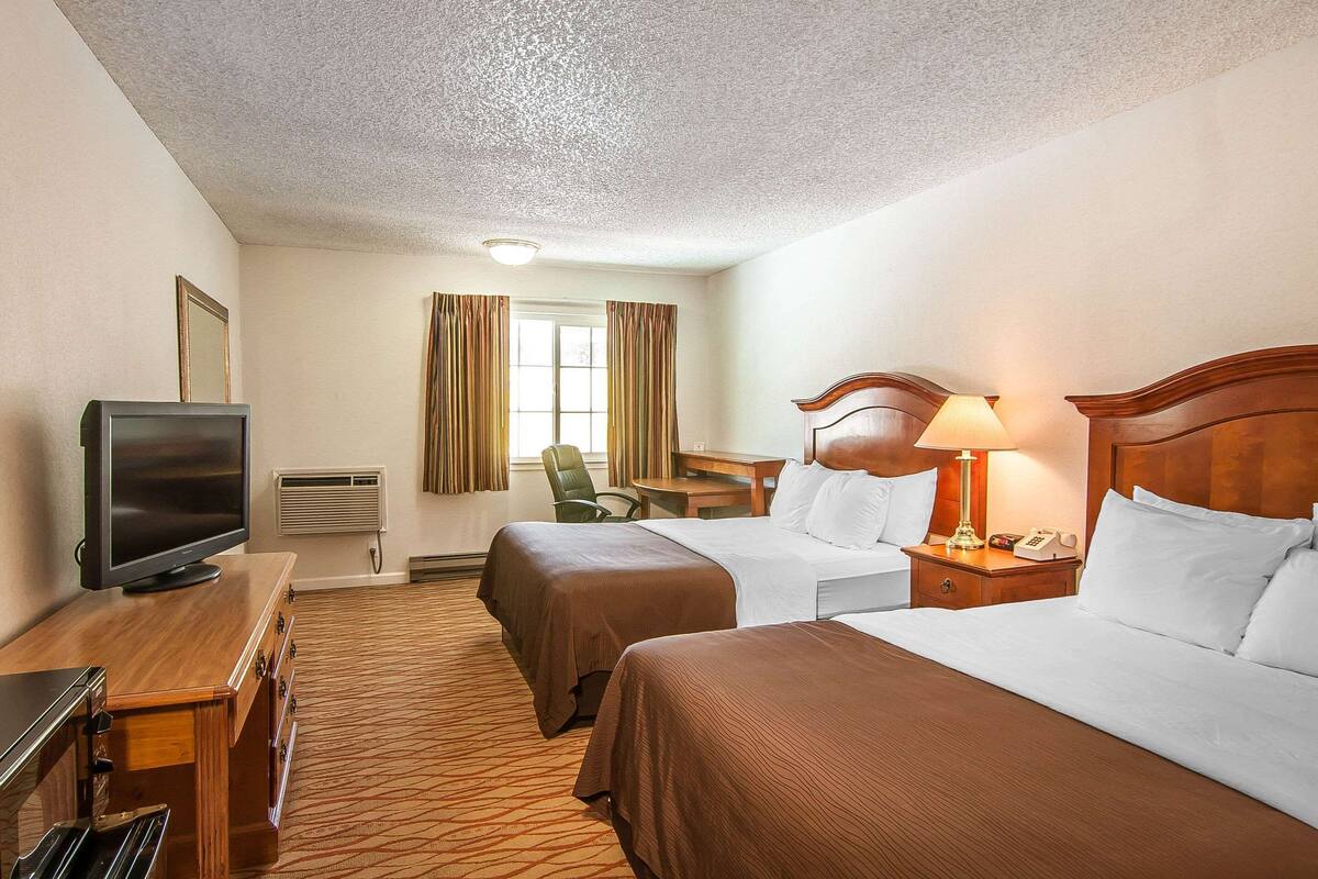 Standard Room, 2 Queen Beds, Non Smoking | Premium bedding, desk, blackout drapes, iron/ironing board