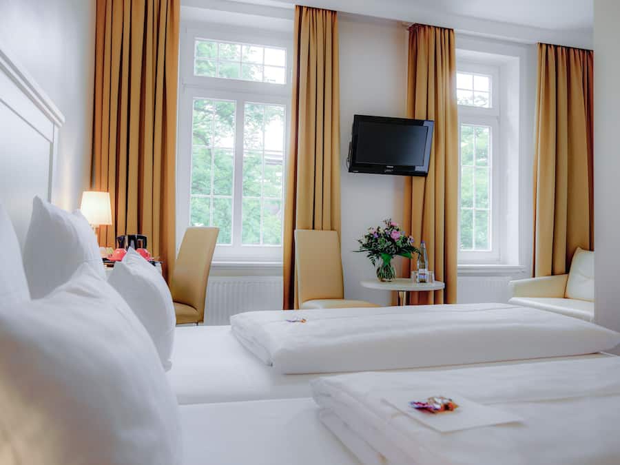 Hypo-allergenic bedding, in-room safe, desk, iron/ironing board