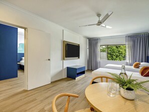 Family Room, Multiple Beds (1 Queen and 2 Singles) | Minibar, desk, laptop workspace, iron/ironing board - Mercure Cairns (Cairns)