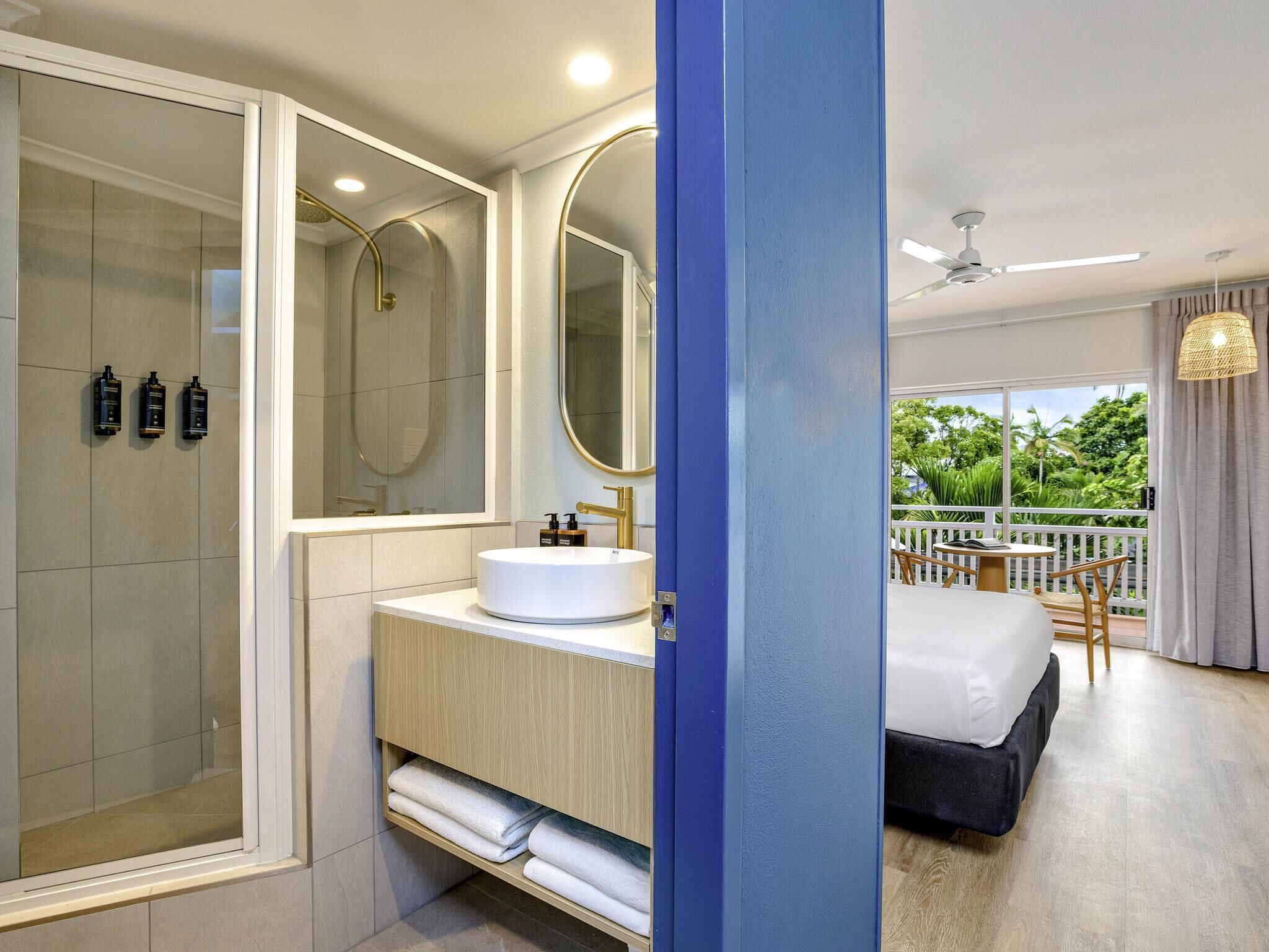 Family Room, Multiple Beds (1 Queen and 2 Singles) | Minibar, desk, laptop workspace, iron/ironing board