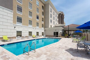 Outdoor pool, pool umbrellas, sun loungers