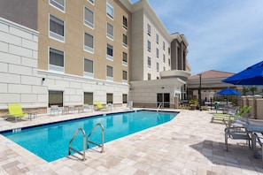 Outdoor pool, pool umbrellas, sun loungers