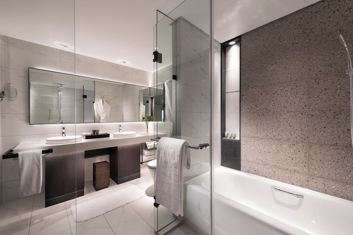 eco-friendly toiletries, hair dryer, bathrobes, slippers