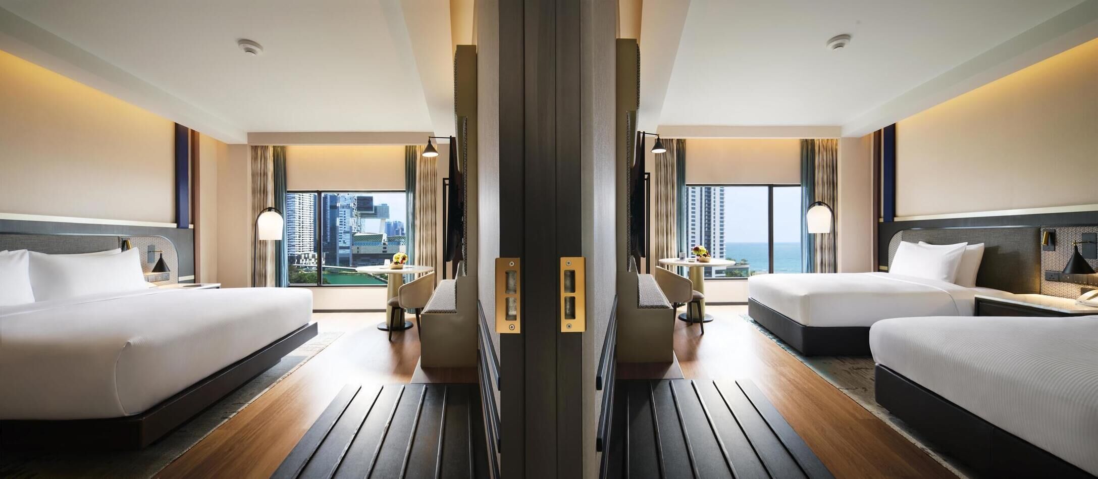 Roba de llit hipoal·lergògena, minibar i caixa forta a l'habitació 