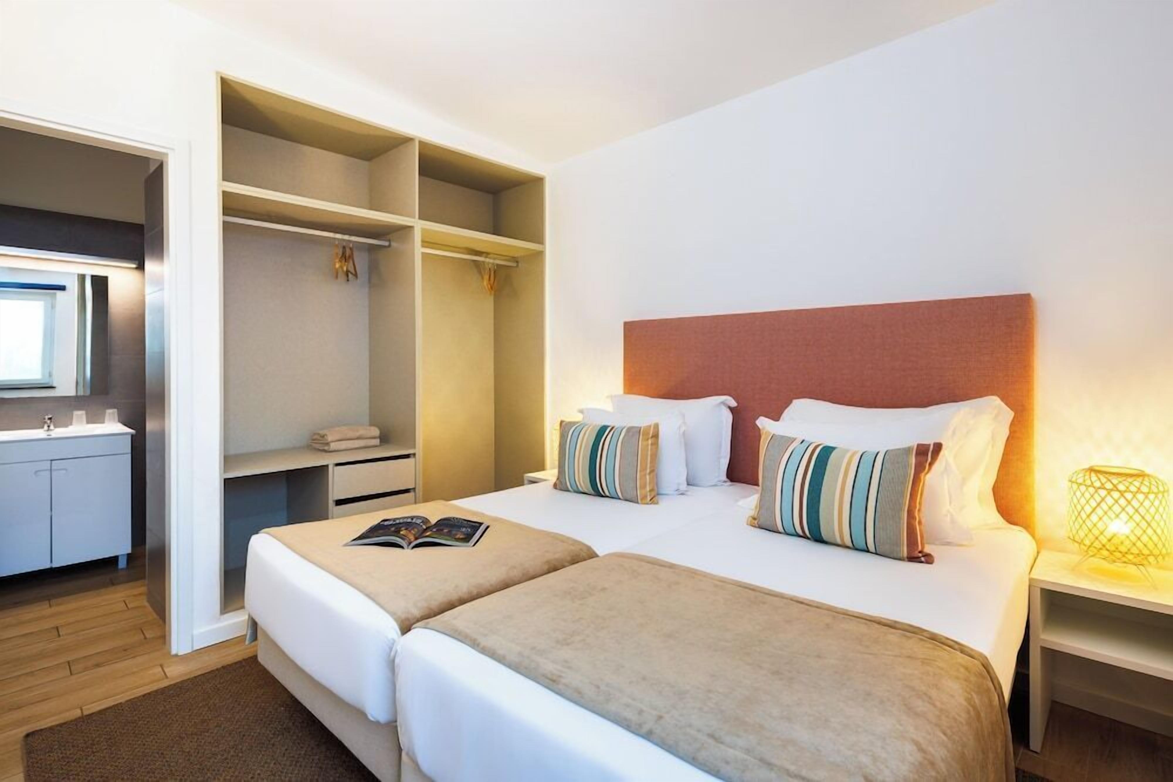 Minibar, in-room safe, blackout curtains, free cots/infant beds