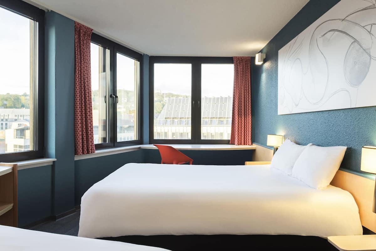 superior room, multiple beds | premium bedding, desk, laptop workspace, iron/ironing board