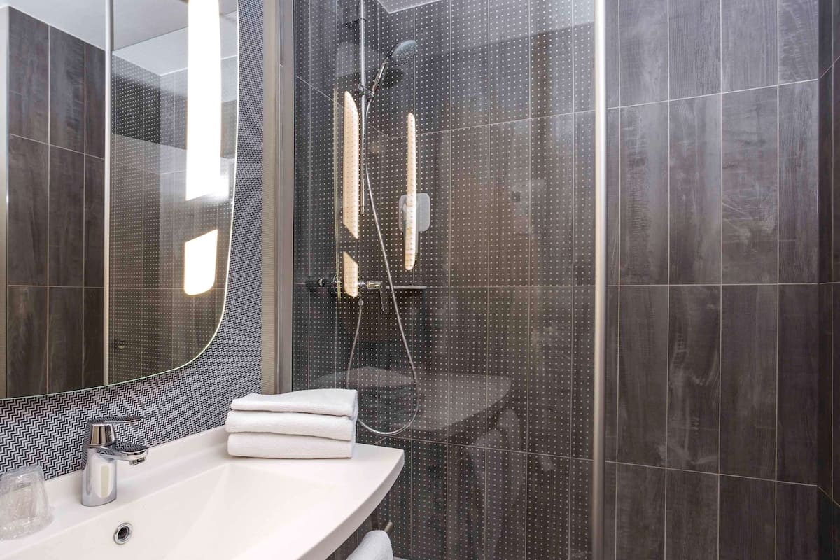 premium bedding, desk, laptop workspace, iron/ironing board