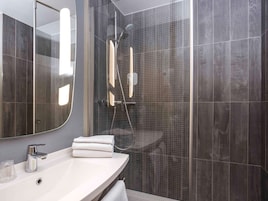 Premium bedding, desk, laptop workspace, iron/ironing board