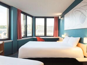 Premium bedding, desk, laptop workspace, iron/ironing board