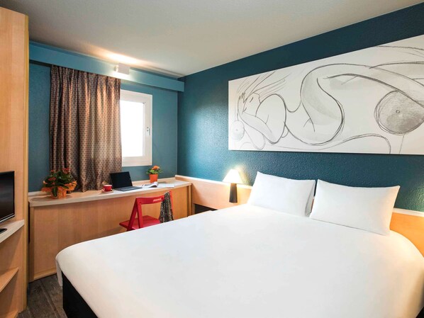 Premium bedding, desk, laptop workspace, iron/ironing board