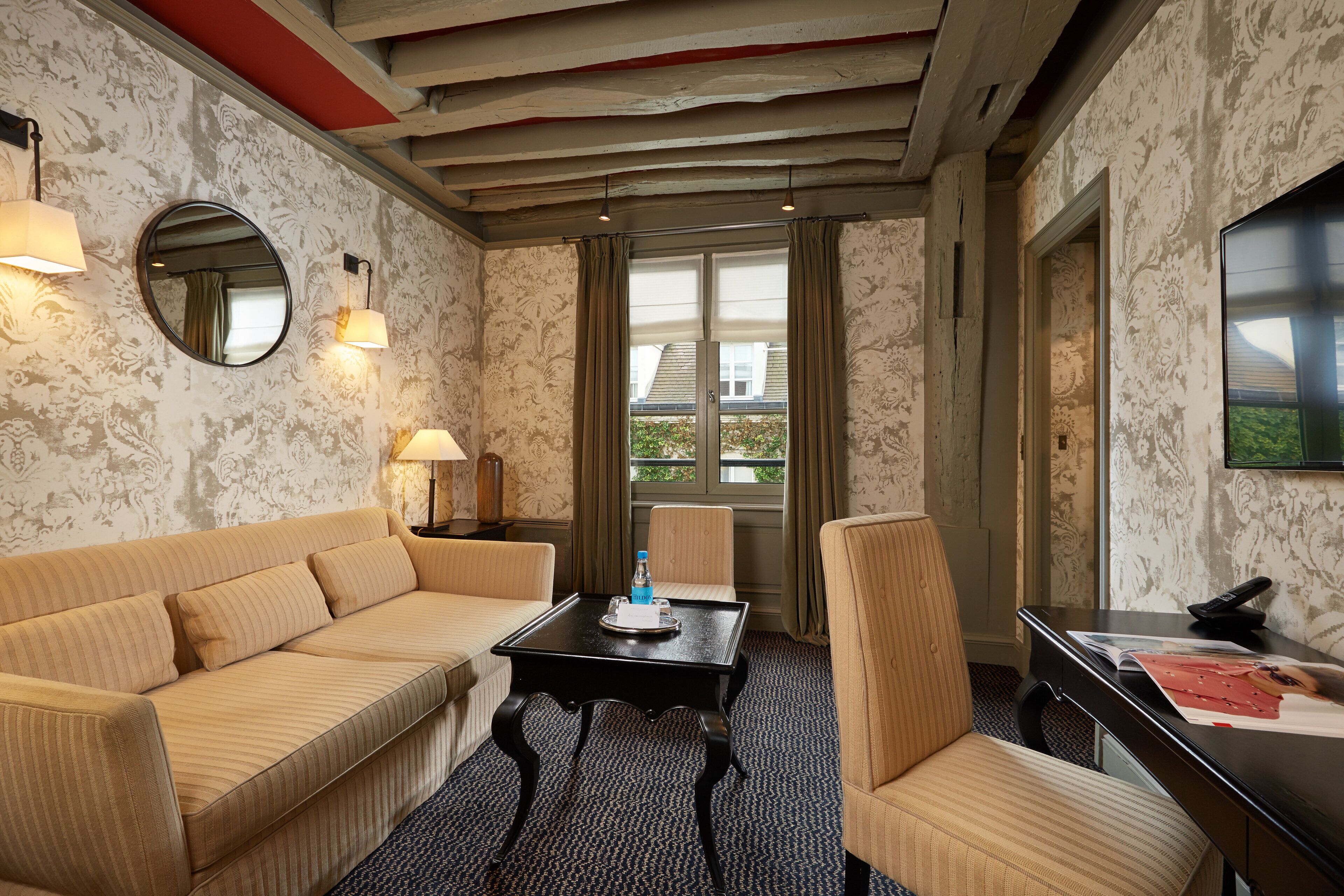 junior suite | 2 bedrooms, free minibar, in-room safe, individually decorated