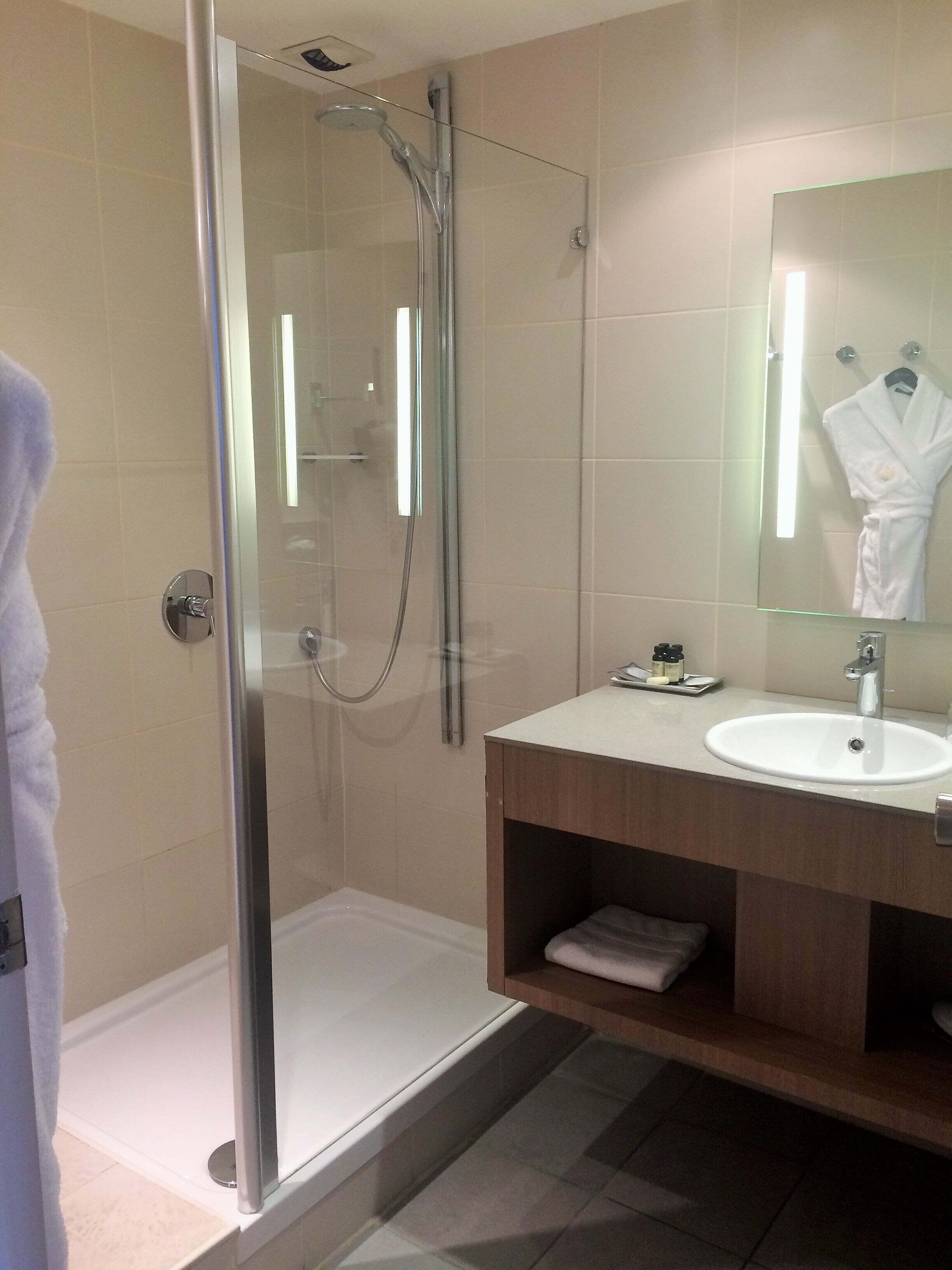 eco-friendly toiletries, hair dryer, towels