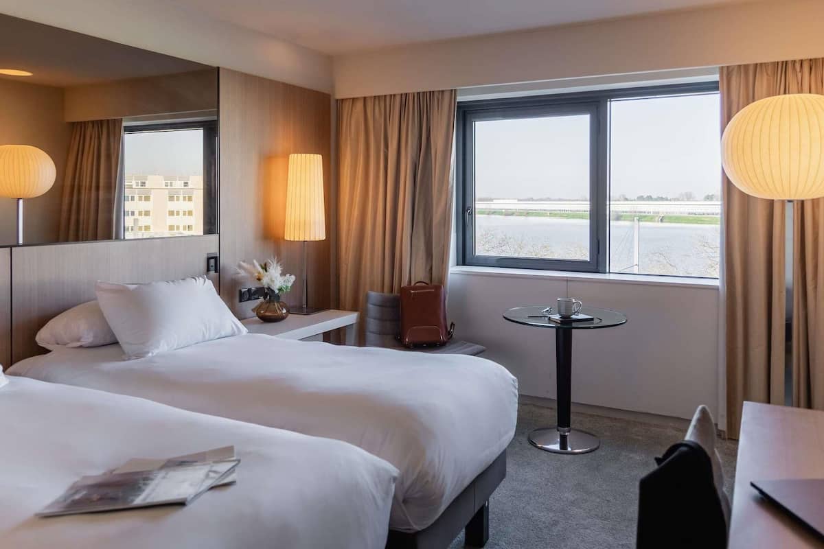 Premium bedding, in-room safe, desk, soundproofing