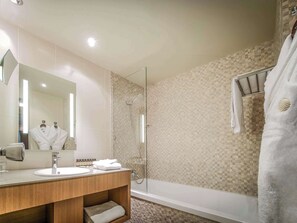 Eco-friendly toiletries, hair dryer, towels