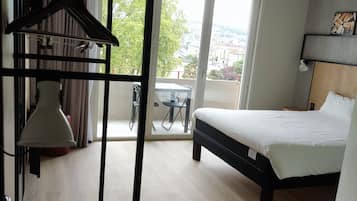 Desk, blackout curtains, soundproofing, iron/ironing board