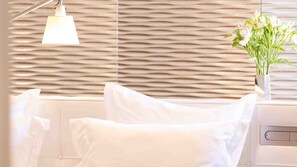 Suite Luxe | Literie de qualité supérieure, mini-bar avec articles gratuits