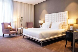 Suíte | Roupas de cama premium, frigobar (abastecido com alguns itens grátis)