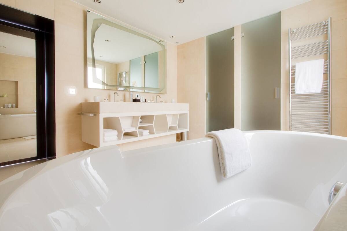luxury suite | bathroom | free toiletries, hair dryer, bathrobes, slippers