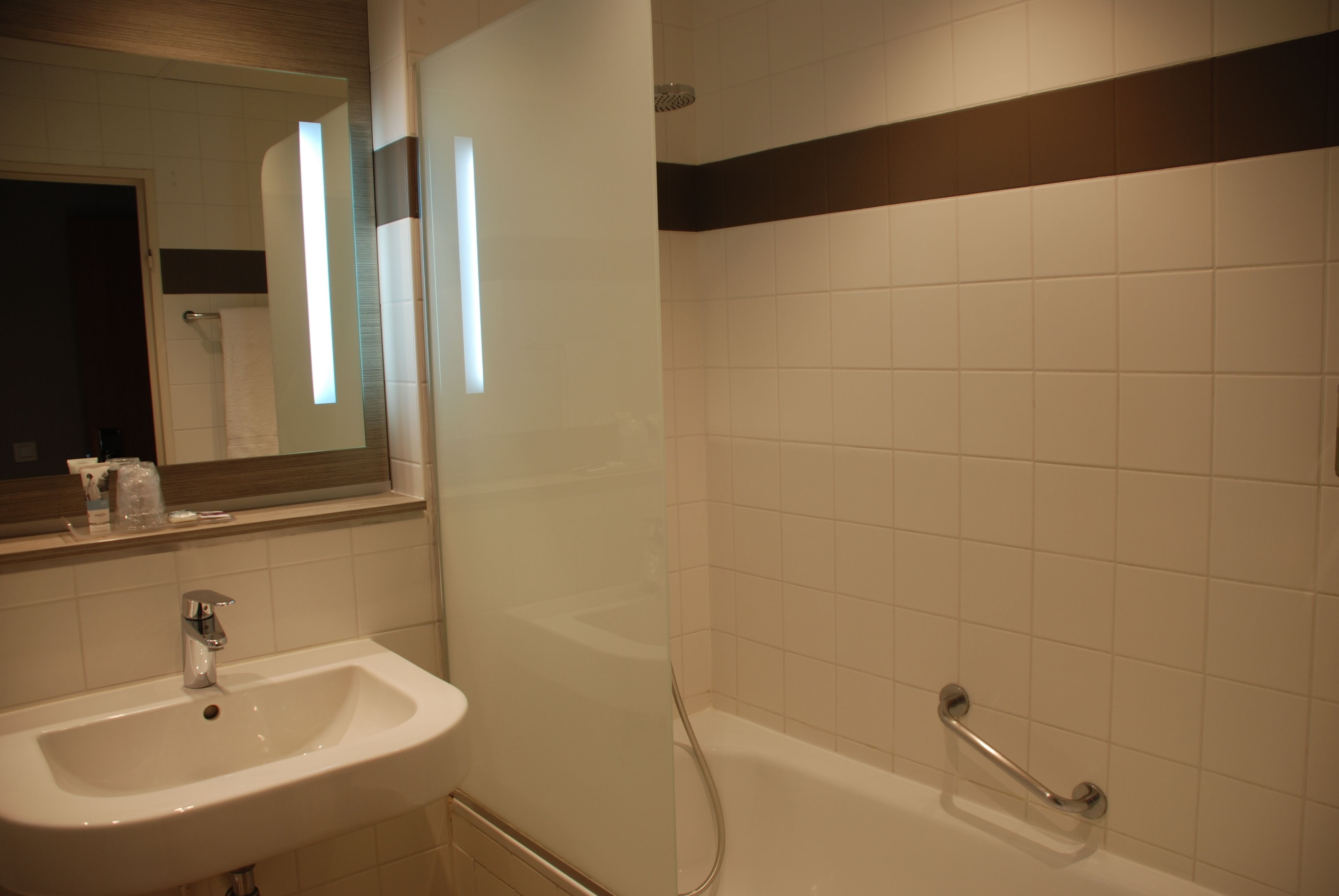 eco-friendly toiletries, hair dryer, towels, toilet paper