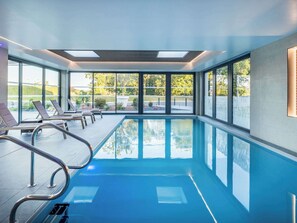 Indoor pool, open 7:30 AM to 10:00 PM, sun loungers