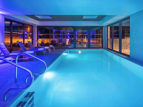 Indoor pool, open 7:30 AM to 10:00 PM, pool loungers